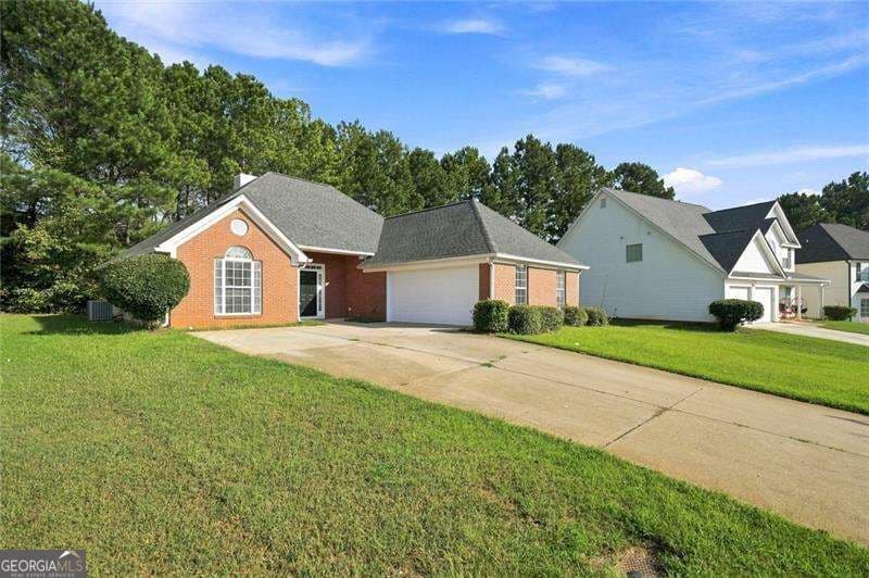 3 bedroom, 2 bathroom, 1,471 sq ft single family residence for sale at 1335 Saint Isabella Court, Locust Grove, GA 30248 — photo 2