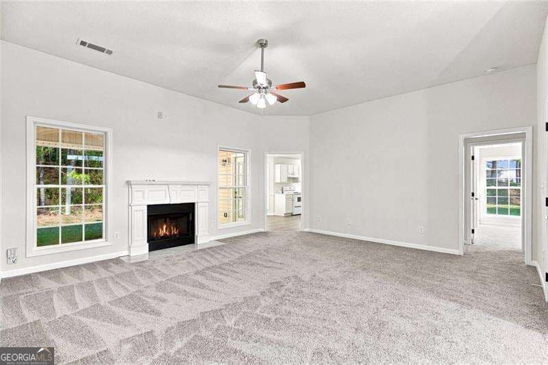 3 bedroom, 2 bathroom, 1,471 sq ft single family residence for sale at 1335 Saint Isabella Court, Locust Grove, GA 30248 — photo 3
