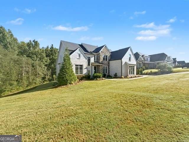 6 bedroom, 5.5 bathroom, 6,468 sq ft single family residence for sale at 5760 Lula Bridge Court, Braselton, GA 30517 — photo 2