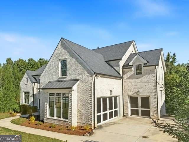 6 bedroom, 5.5 bathroom, 6,468 sq ft single family residence for sale at 5760 Lula Bridge Court, Braselton, GA 30517 — photo 4