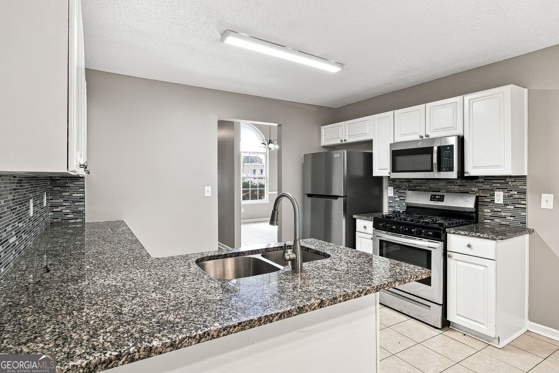 4 bedroom, 3 bathroom, 1,539 sq ft single family residence for sale at 6258 Lakeview Court, Rex, GA 30273 — photo 5