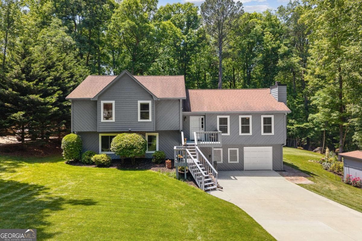 4 bedroom, 3 bathroom, 3,528 sq ft single family residence sold at 2974 Caldwell Circle, Suwanee, GA 30024