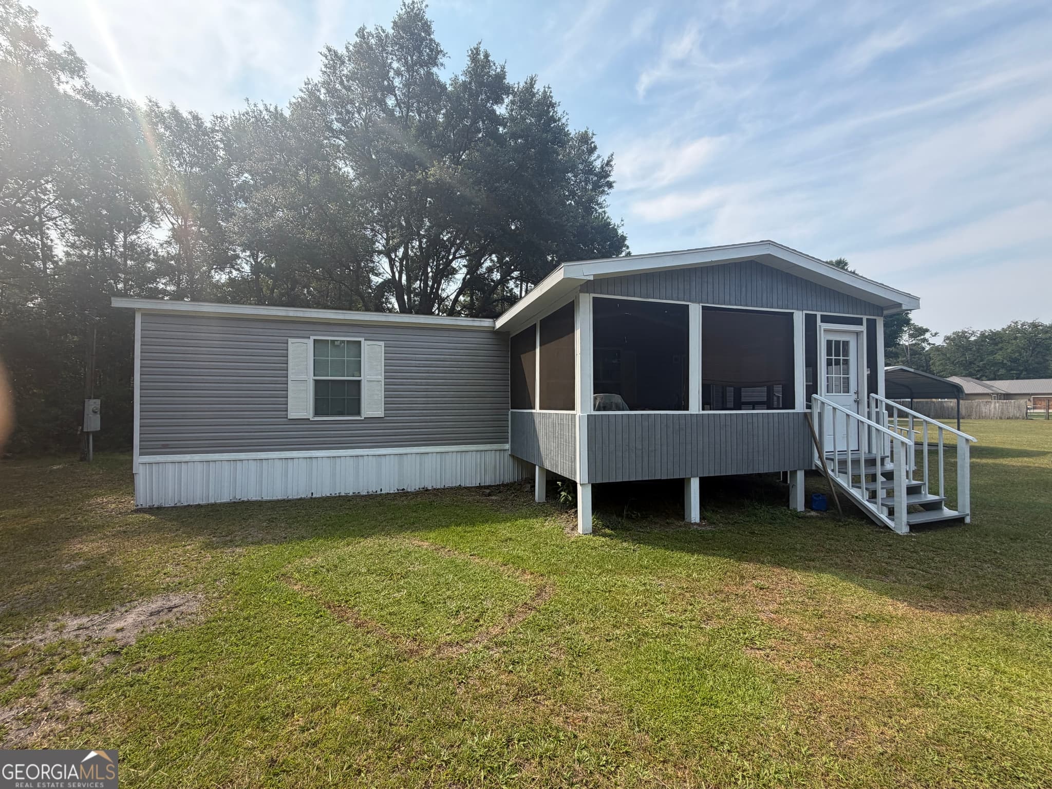 3 bedroom, 2 bathroom, 1,431 sq ft manufactured home,single family residence for sale at 135 Stafford Road, Brunswick, GA 31523 — photo 2