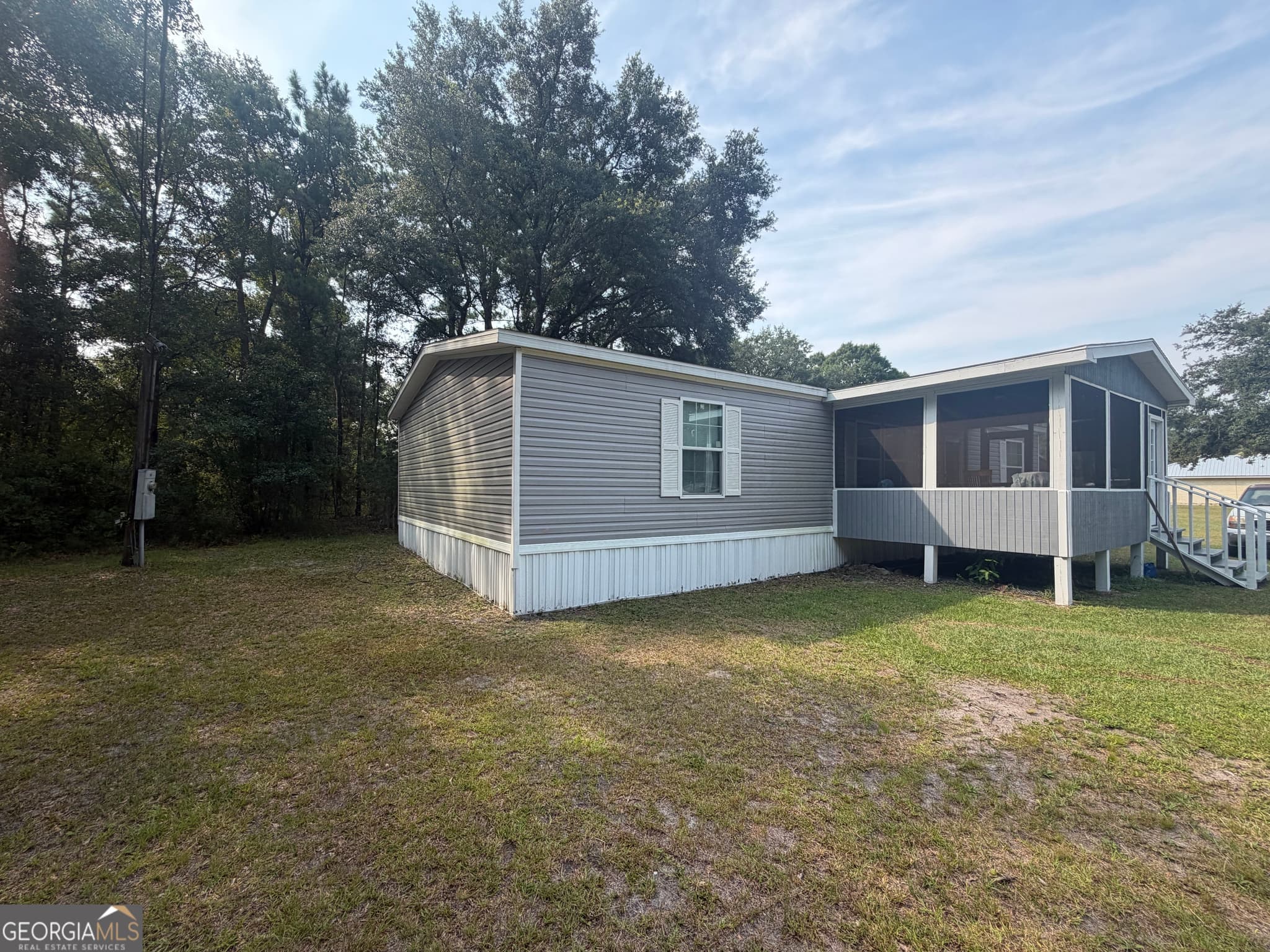 3 bedroom, 2 bathroom, 1,431 sq ft manufactured home,single family residence for sale at 135 Stafford Road, Brunswick, GA 31523 — photo 3