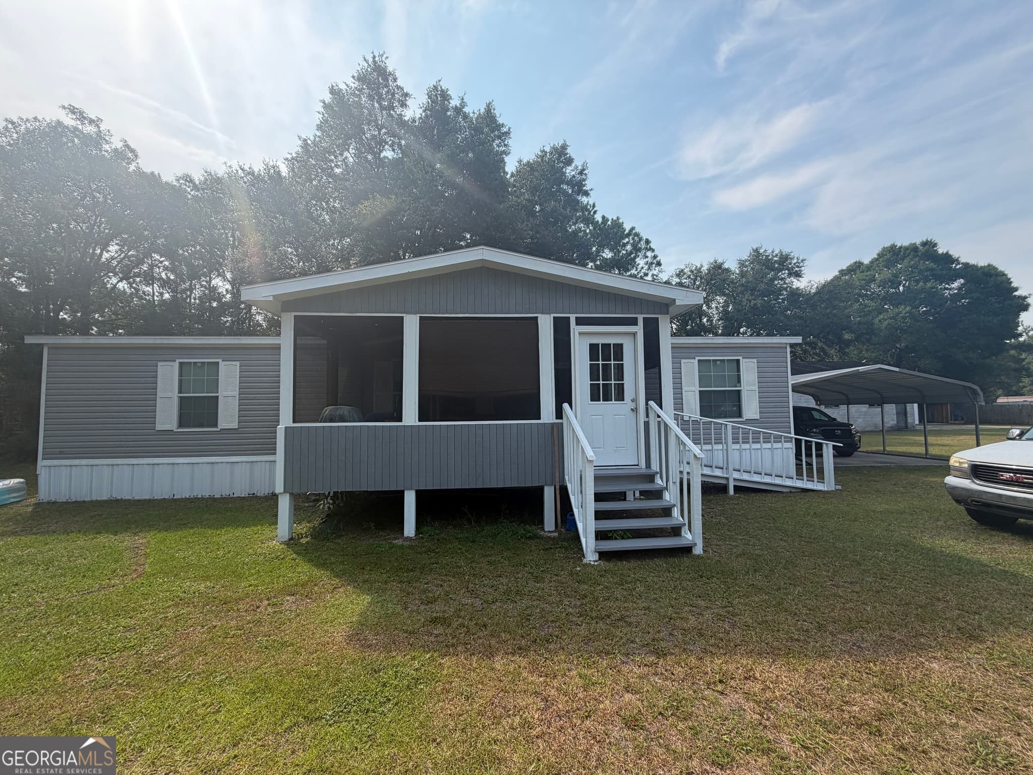 3 bedroom, 2 bathroom, 1,431 sq ft manufactured home,single family residence for sale at 135 Stafford Road, Brunswick, GA 31523