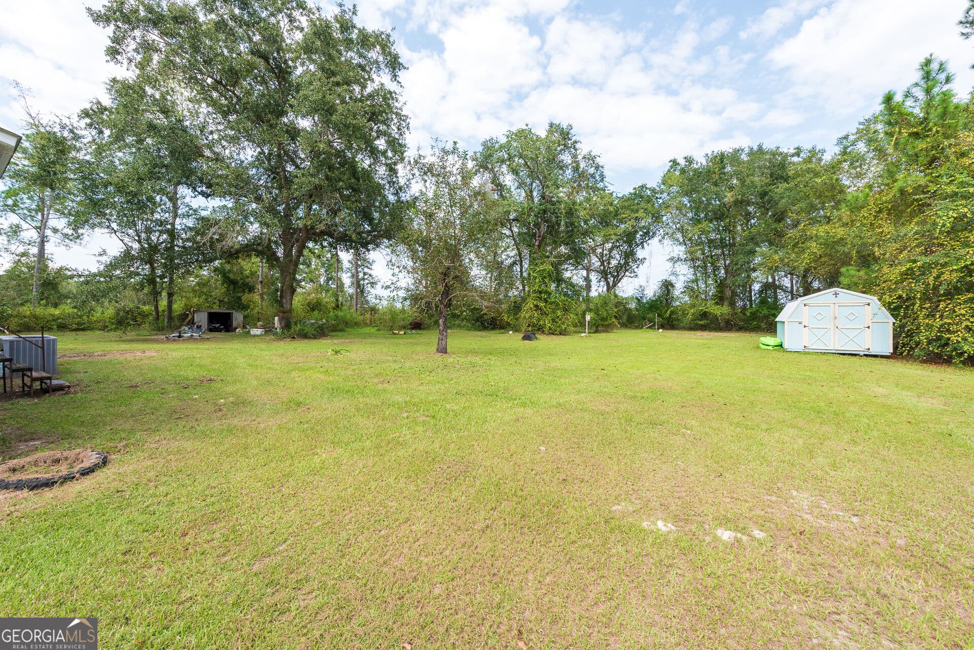 4 bedroom, 2 bathroom, 1,560 sq ft manufactured home,single family residence for sale at 569 Shady Oaks Circle, Hoboken, GA 31542 — photo 7