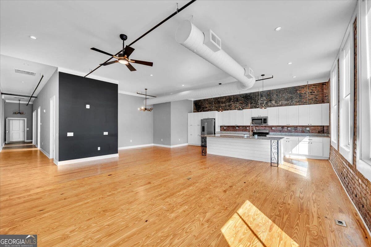 5 bedroom, 6 bathroom, 9,650 sq ft loft,single family residence for sale at 565 Poplar Street, Macon, GA 31210 — photo 6