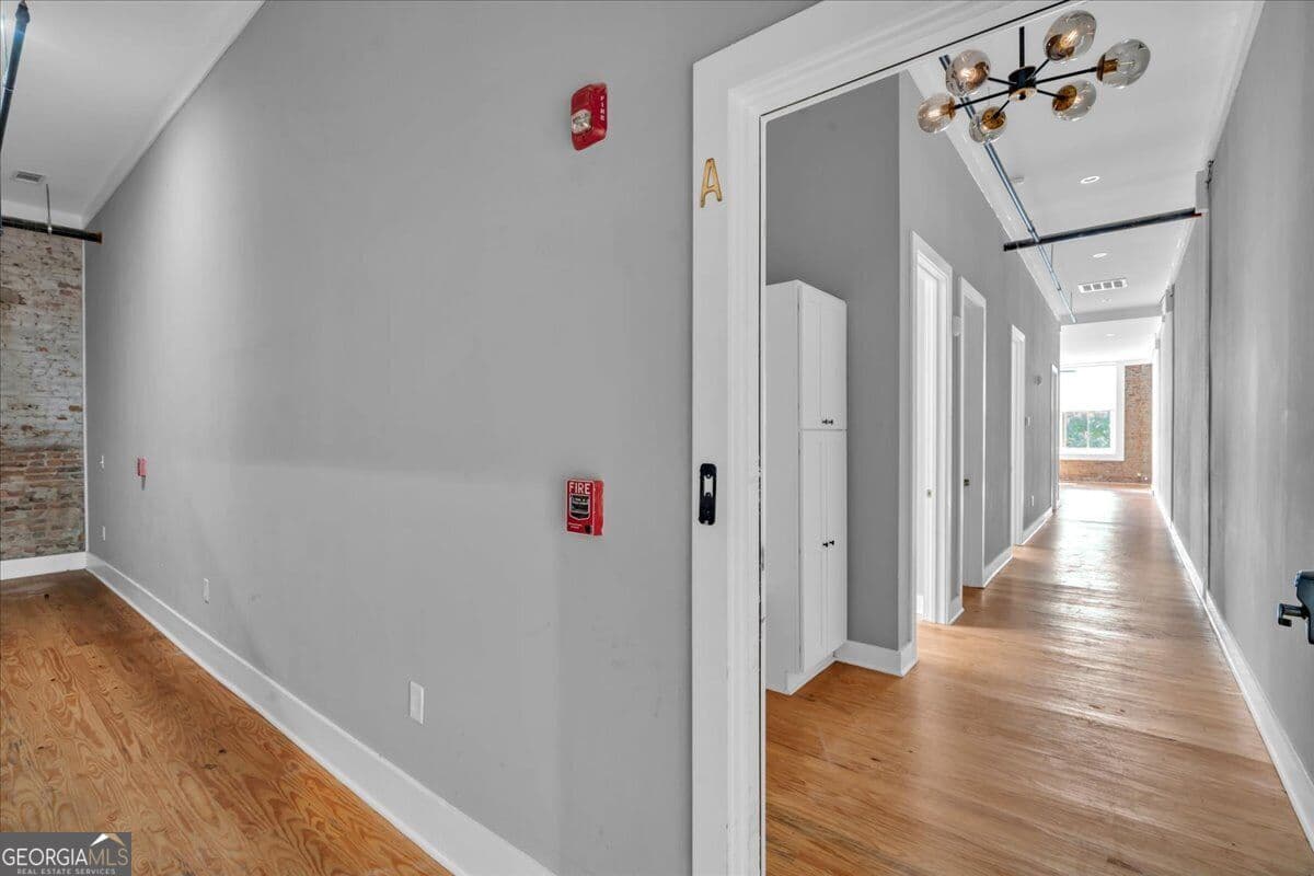 5 bedroom, 6 bathroom, 9,650 sq ft loft,single family residence for sale at 565 Poplar Street, Macon, GA 31210 — photo 4