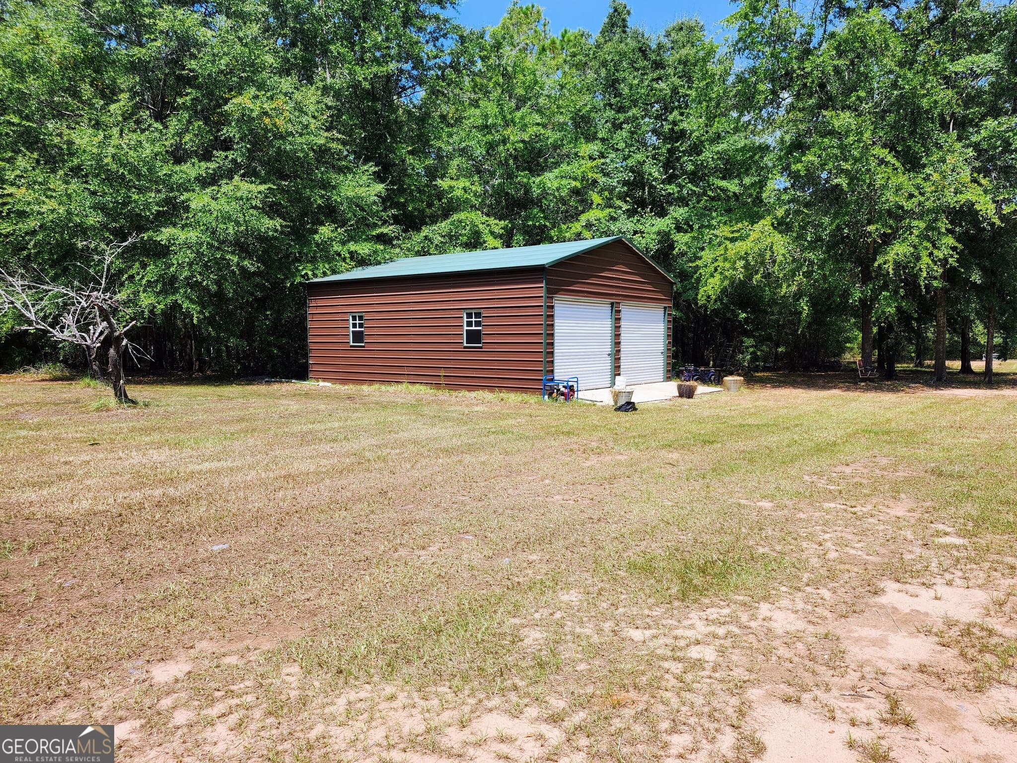 3 bedroom, 2 bathroom, 2,040 sq ft manufactured home,single family residence for sale at 482 Campers Haven Road, Vienna, GA 31092 — photo 5