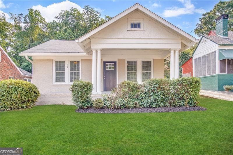 3 bedroom, 1 bathroom, 980 sq ft single family residence for sale at 555 Holly Street, Atlanta, GA 30318 — photo 1 of 10