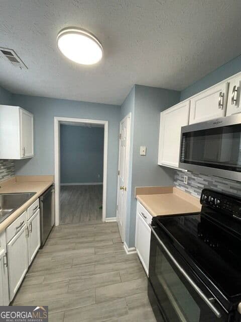 3 bedroom, 2 bathroom, 1,460 sq ft single family residence for rent at 407 George Tate Drive, Jackson, GA 30233 for $1,875 a month — photo 3