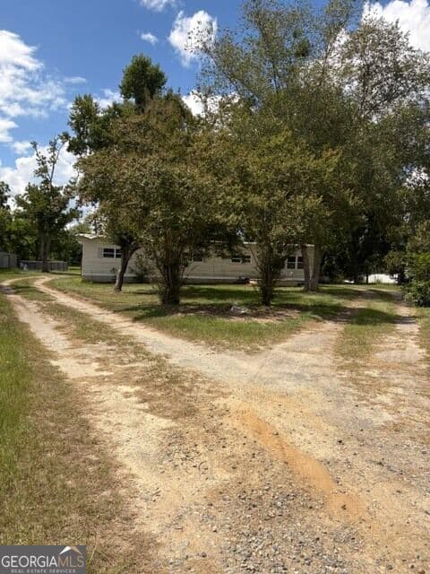 3 bedroom, 1.5 bathroom, 1,440 sq ft manufactured home,single family residence for sale at 177 Dewey Warnock Road, East Dublin, GA 31027 — photo 2