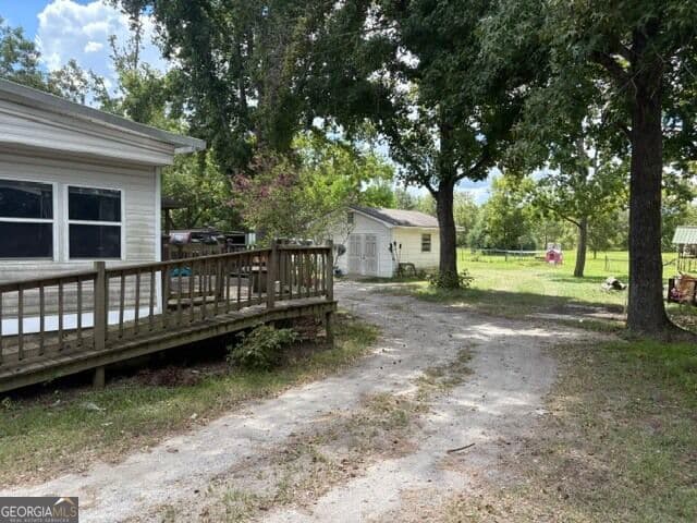 3 bedroom, 1.5 bathroom, 1,440 sq ft manufactured home,single family residence for sale at 177 Dewey Warnock Road, East Dublin, GA 31027 — photo 1 of 14