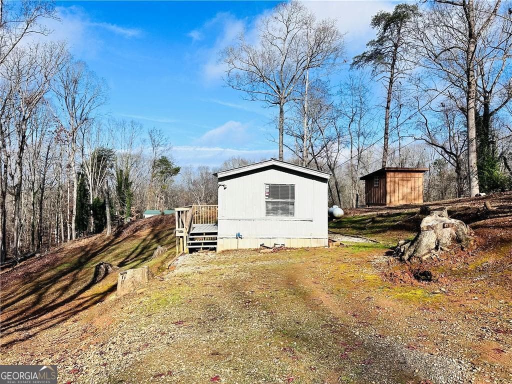 2 bedroom, 2 bathroom, 950 sq ft single family residence for sale at 6134 Grant Ford Road, Gainesville, GA 30506 — photo 1 of 13