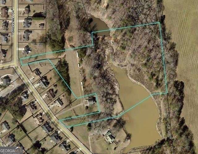 residential lot for sale at 120 Bridgemill Drive, Hampton, GA 30228 — photo 2