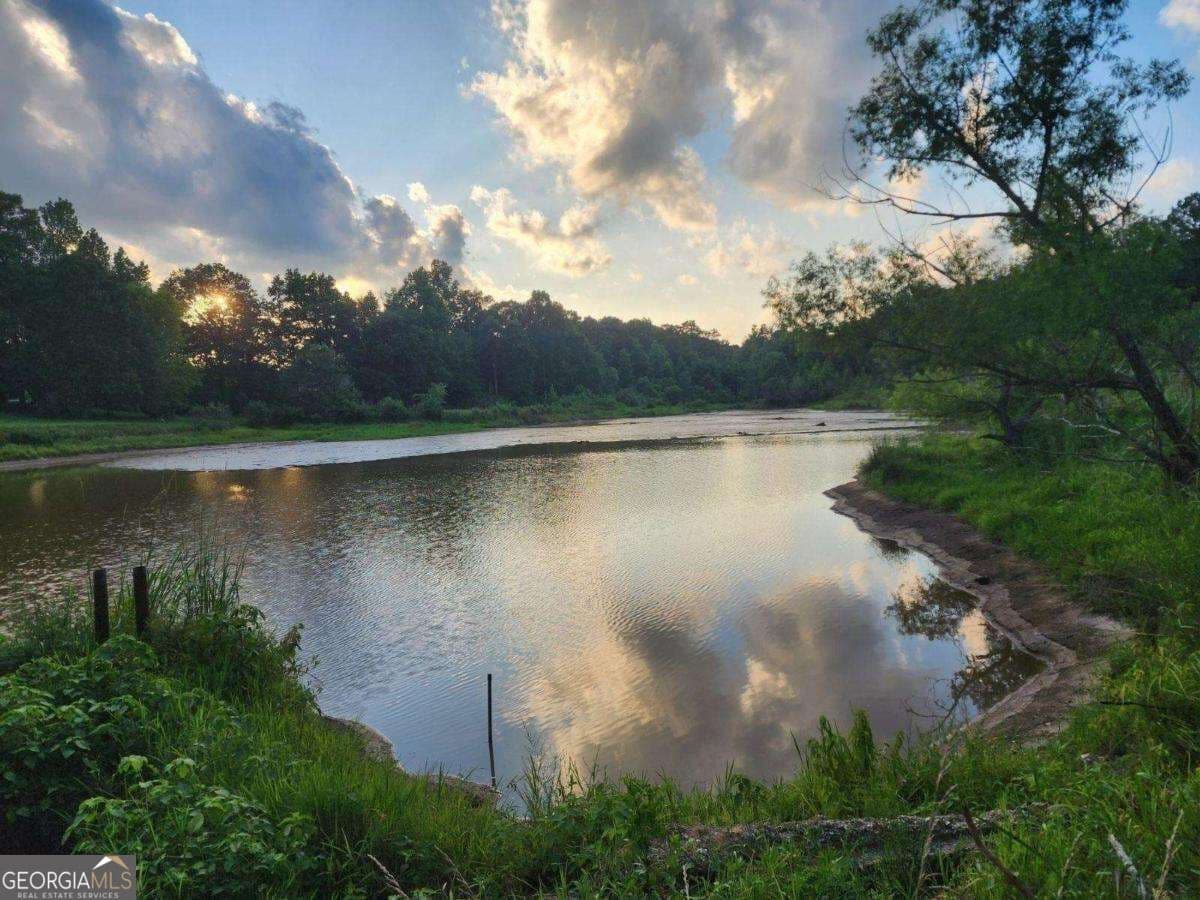 residential lot for sale at 120 Bridgemill Drive, Hampton, GA 30228 — photo 1 of 13