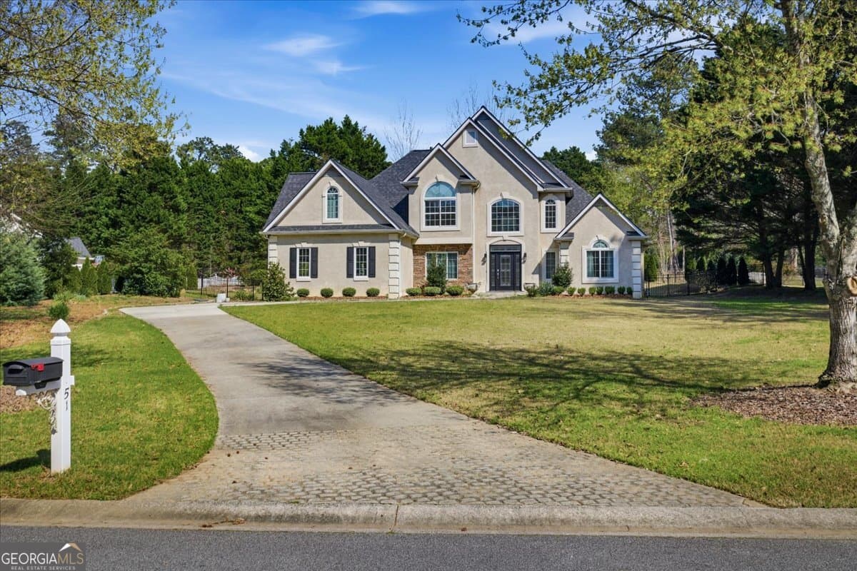 4 bedroom, 3.5 bathroom, 2,500 sq ft single family residence sold at 51 French Village Boulevard, Sharpsburg, GA 30277