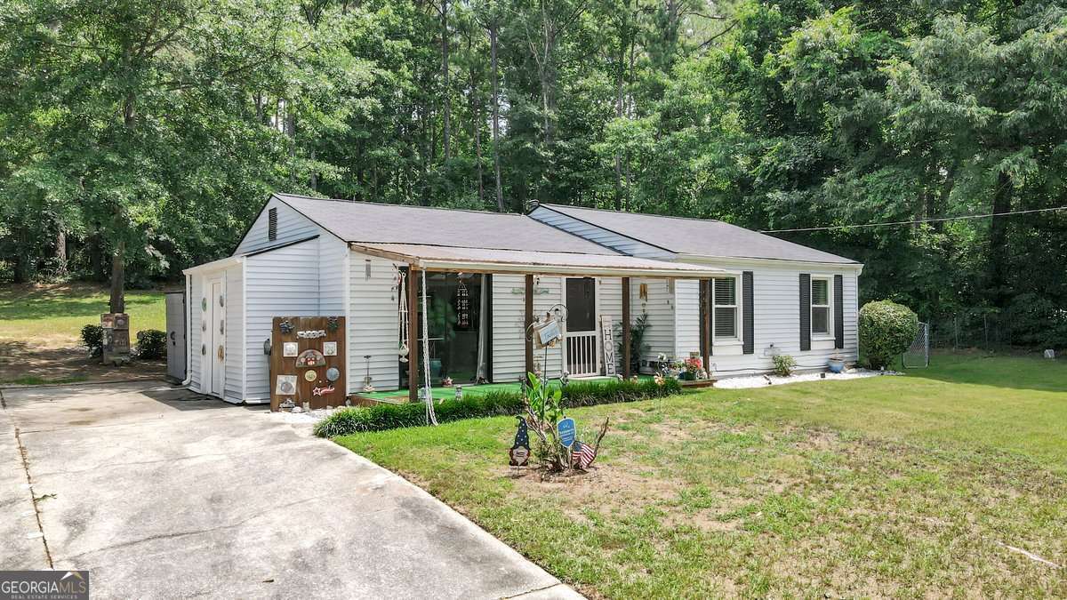 3 bedroom, 2 bathroom, 1,040 sq ft single family residence for sale at 3184 Newcastle Way, Snellville, GA 30039 — photo 5