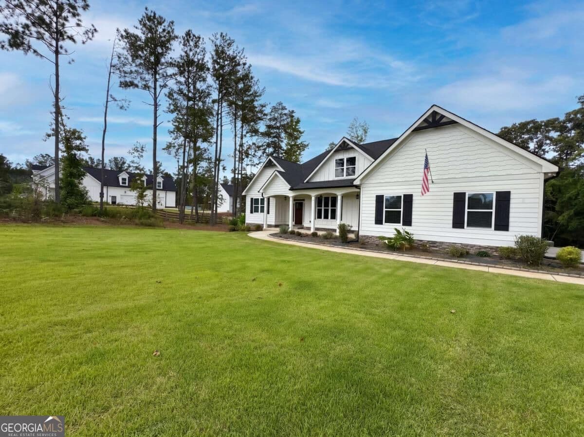 4 bedroom, 3 bathroom, 4,442 sq ft single family residence for sale at 4501 Yellow Creek Road, Ball Ground, GA 30107 — photo 2