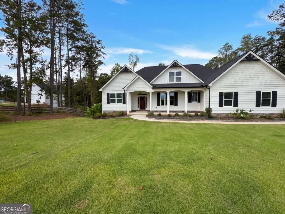 4 bedroom, 3 bathroom, 4,442 sq ft single family residence for sale at 4501 Yellow Creek Road, Ball Ground, GA 30107 — photo 1 of 32