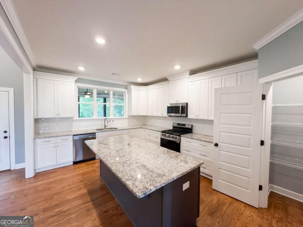 4 bedroom, 3 bathroom, 4,442 sq ft single family residence for sale at 4501 Yellow Creek Road, Ball Ground, GA 30107 — photo 9