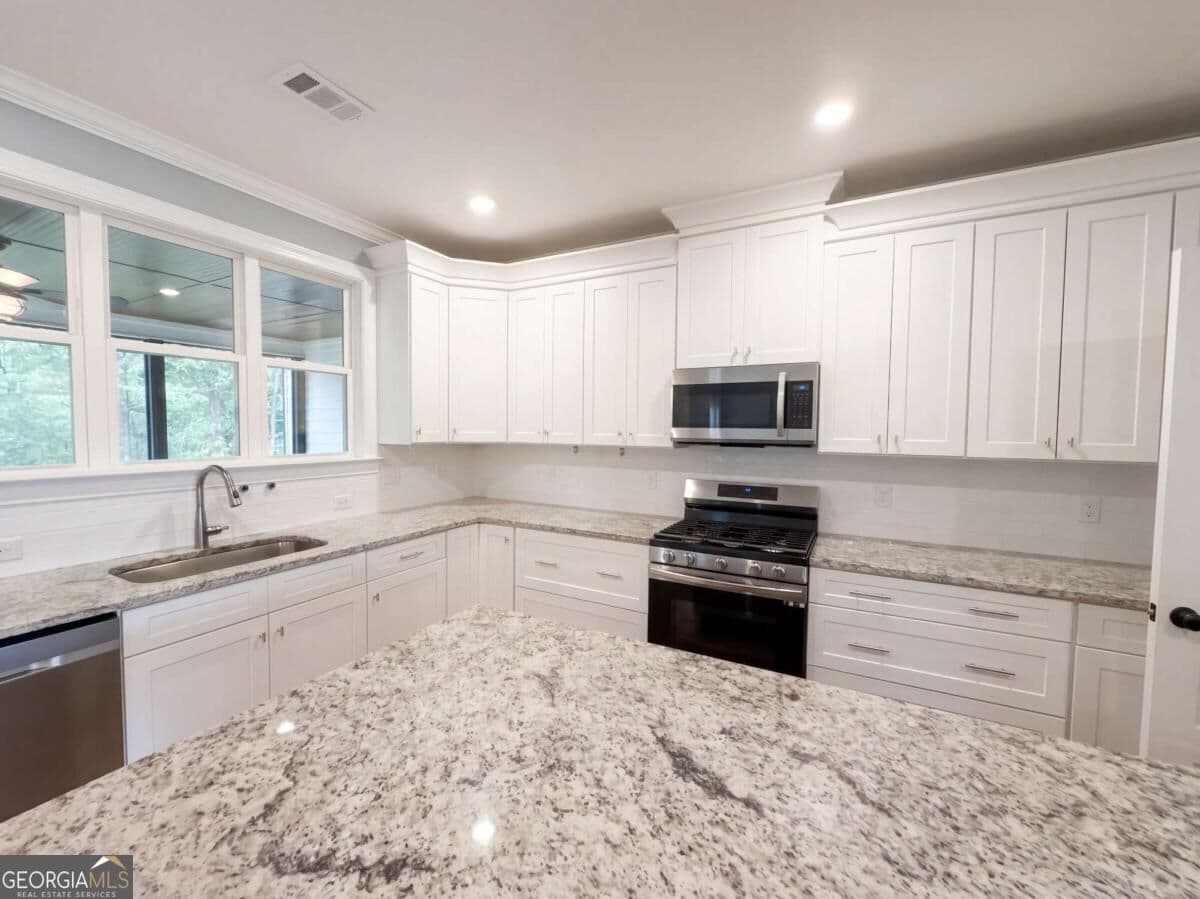 4 bedroom, 3 bathroom, 4,442 sq ft single family residence for sale at 4501 Yellow Creek Road, Ball Ground, GA 30107 — photo 10