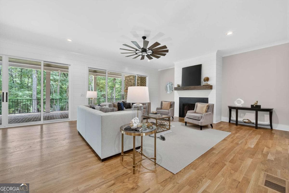4 bedroom, 5.5 bathroom, 5,800 sq ft single family residence for sale at 7620 Breeze Bay Road, Cumming, GA 30041 — photo 6