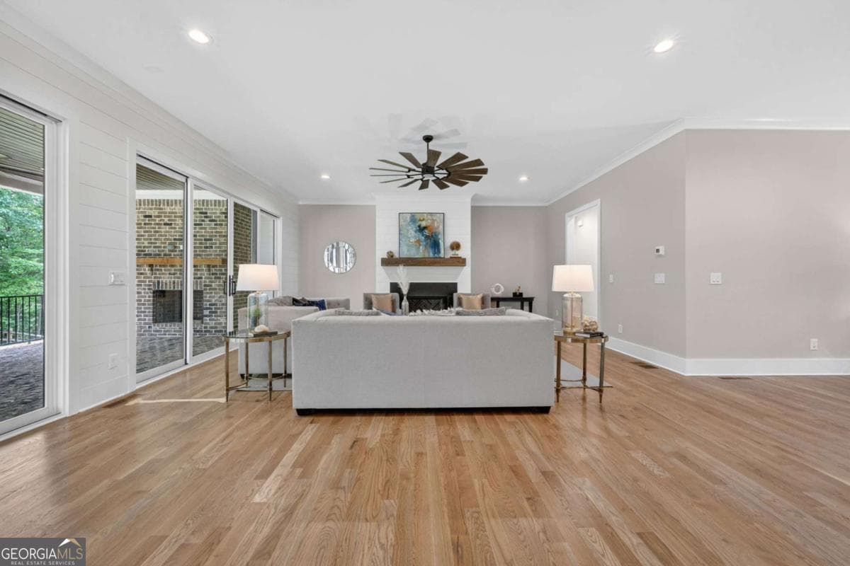 4 bedroom, 5.5 bathroom, 5,800 sq ft single family residence for sale at 7620 Breeze Bay Road, Cumming, GA 30041 — photo 7