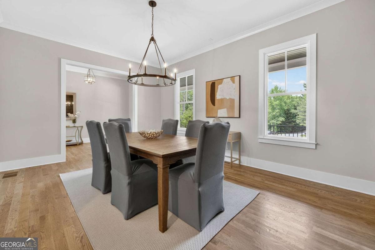 4 bedroom, 5.5 bathroom, 5,800 sq ft single family residence for sale at 7620 Breeze Bay Road, Cumming, GA 30041 — photo 5