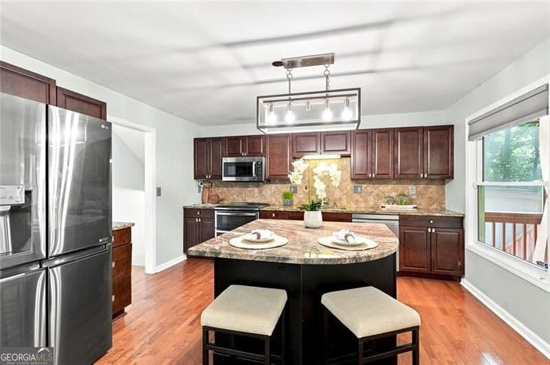 4 bedroom, 3 bathroom, 2,850 sq ft single family residence for sale at 3442 Winter Wood Trace, Marietta, GA 30062 — photo 4