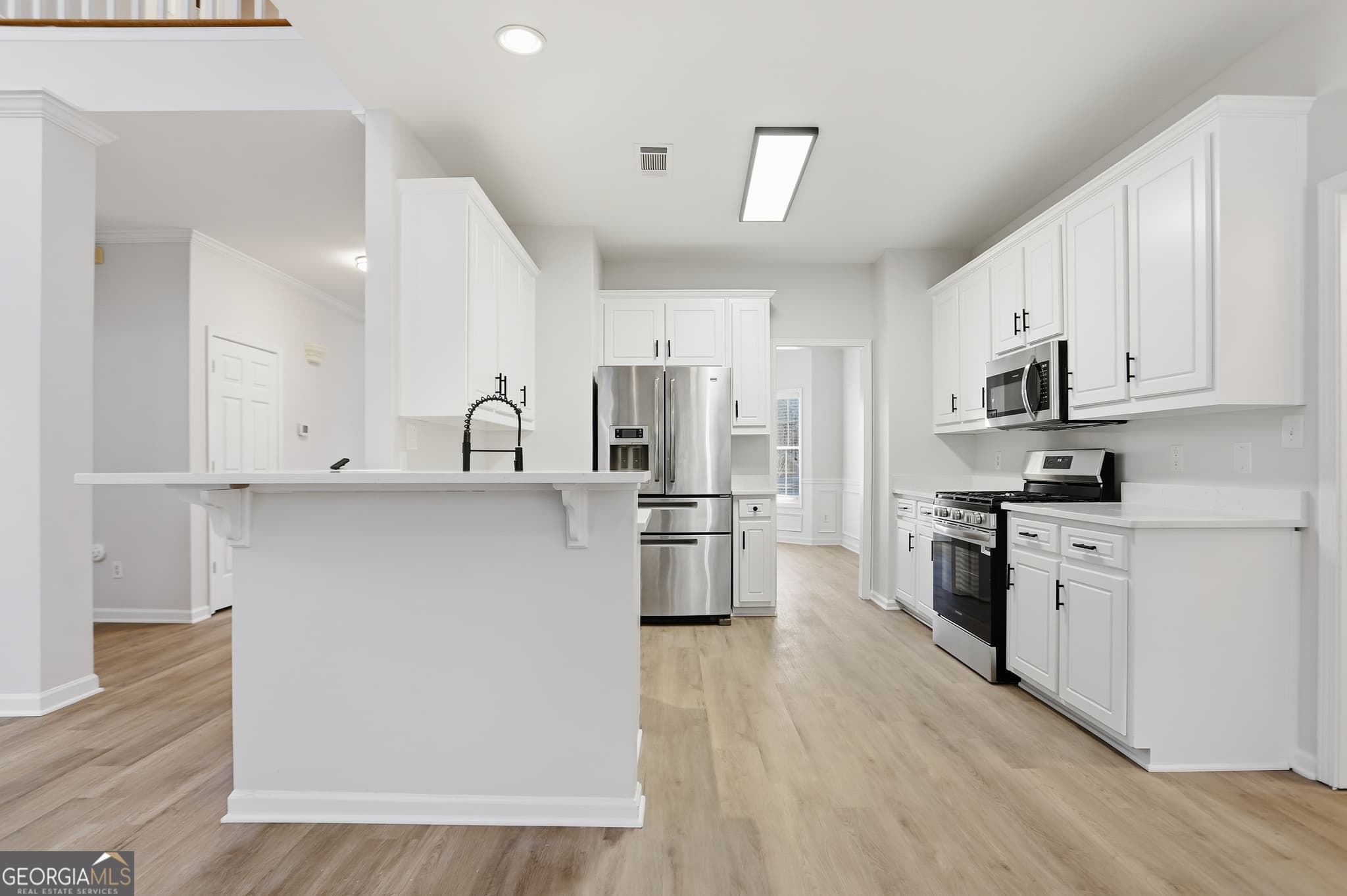 4 bedroom, 2.5 bathroom, 2,730 sq ft single family residence for sale at 1210 Arthur Court, Lawrenceville, GA 30043 — photo 6