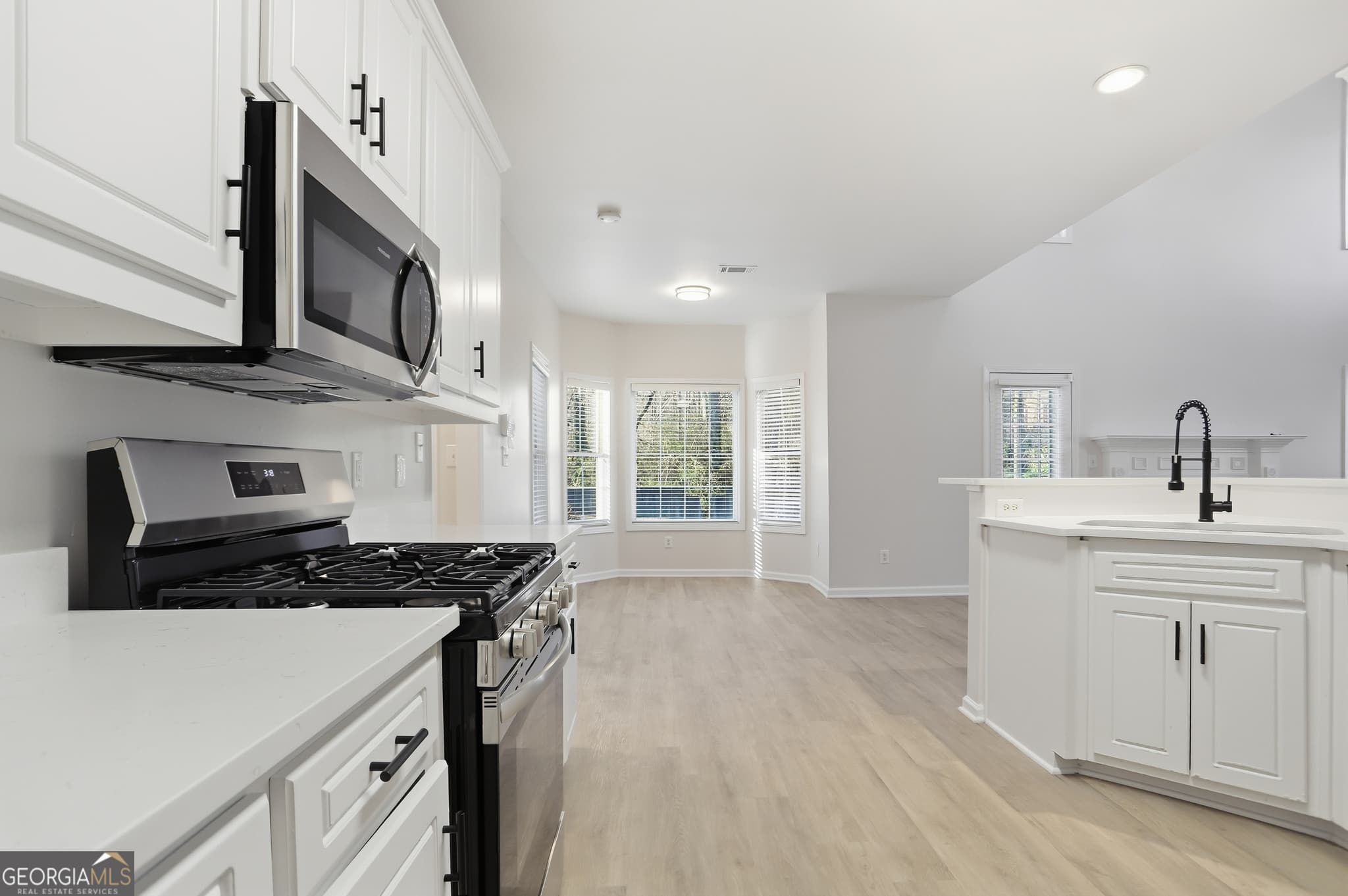 4 bedroom, 2.5 bathroom, 2,730 sq ft single family residence for sale at 1210 Arthur Court, Lawrenceville, GA 30043 — photo 8