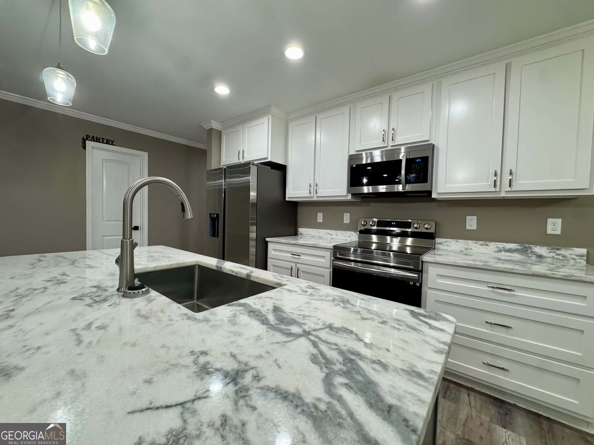4 bedroom, 2 bathroom, 1,748 sq ft single family residence for sale at 1034 Field Street, Dudley, GA 31022 — photo 2