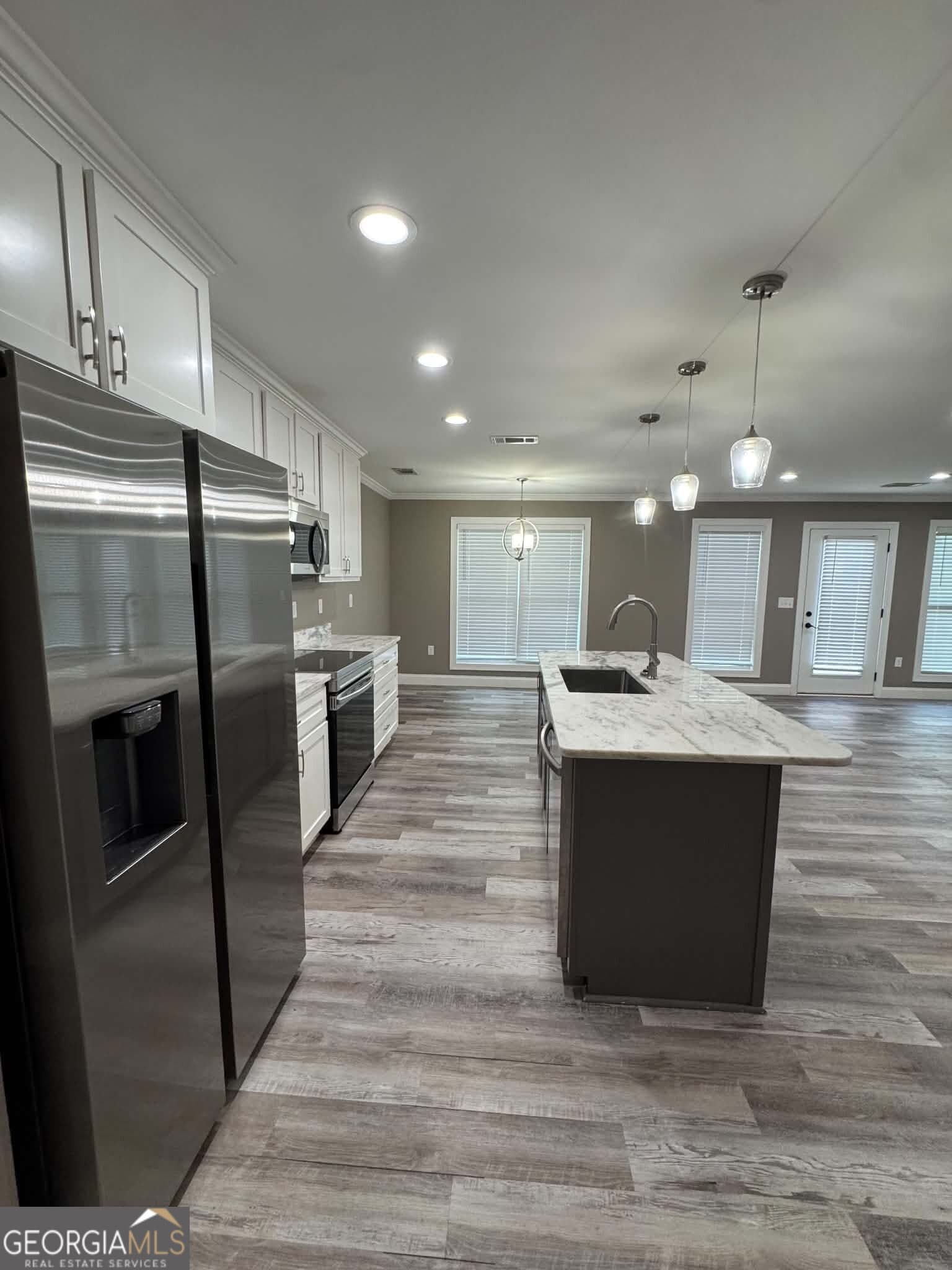 4 bedroom, 2 bathroom, 1,748 sq ft single family residence for sale at 1034 Field Street, Dudley, GA 31022 — photo 6