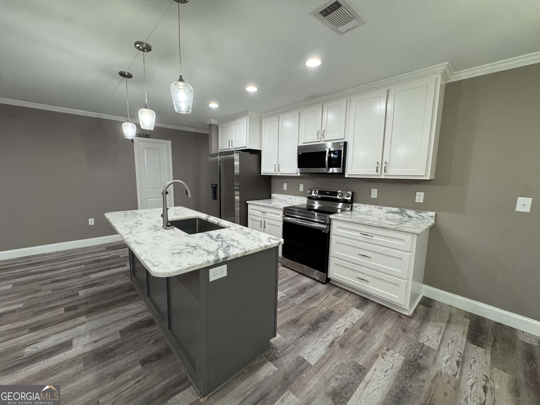 4 bedroom, 2 bathroom, 1,748 sq ft single family residence for sale at 1034 Field Street, Dudley, GA 31022 — photo 3