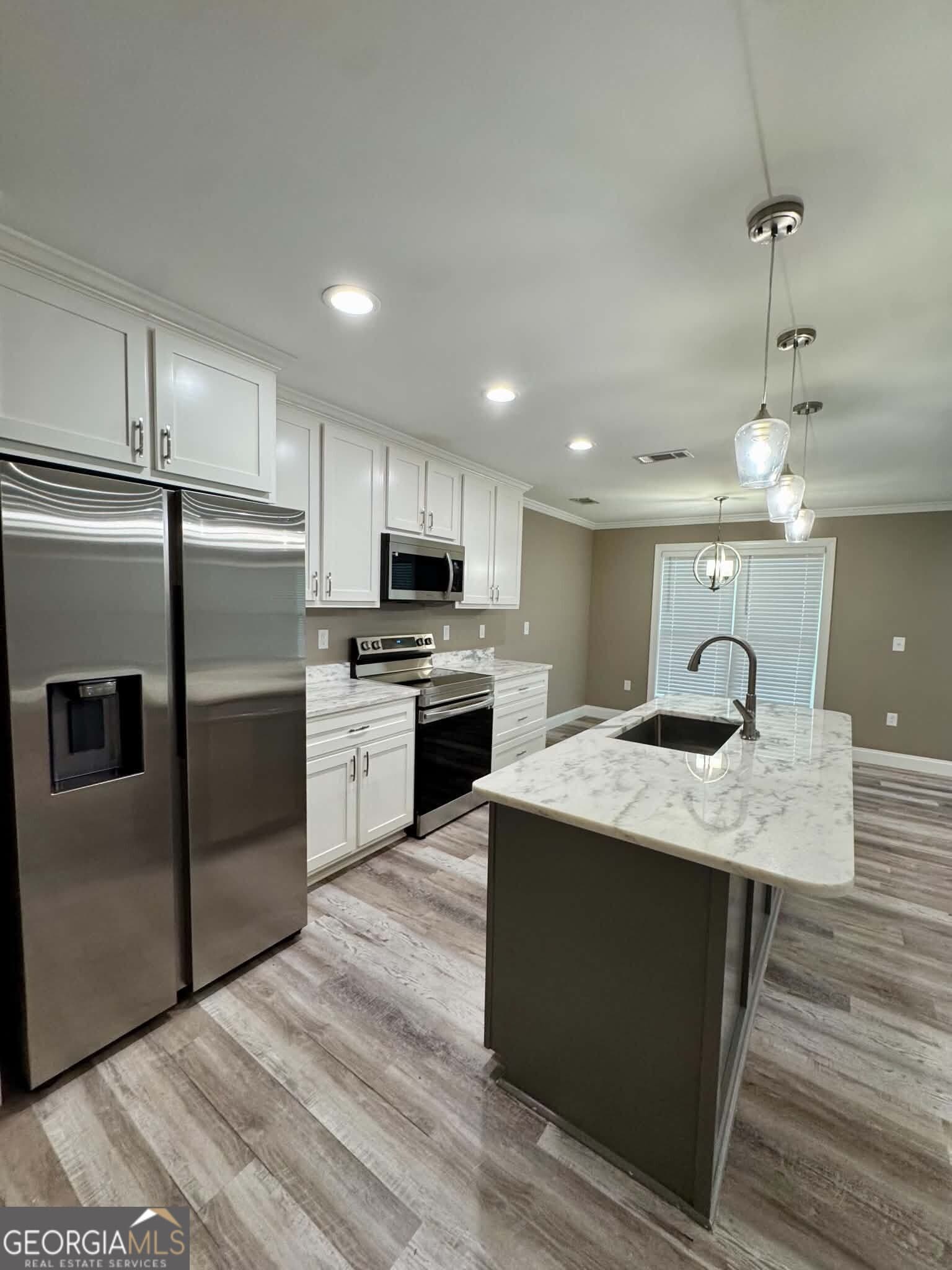 4 bedroom, 2 bathroom, 1,748 sq ft single family residence for sale at 1034 Field Street, Dudley, GA 31022 — photo 5