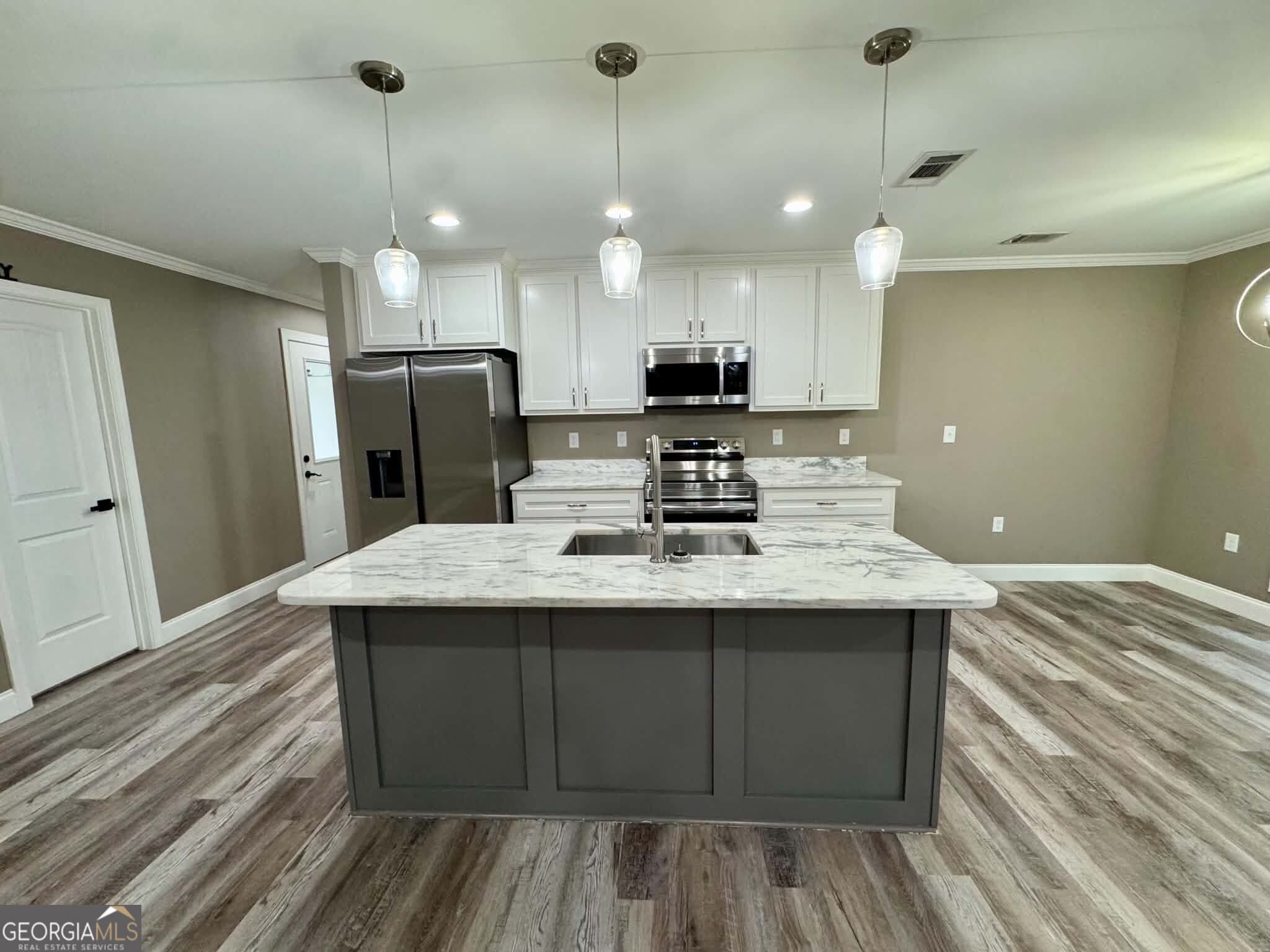4 bedroom, 2 bathroom, 1,748 sq ft single family residence for sale at 1034 Field Street, Dudley, GA 31022 — photo 4
