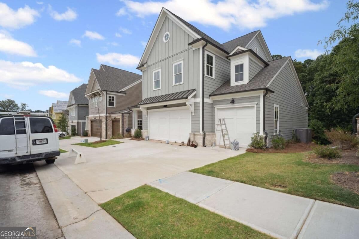 5 bedroom, 4.5 bathroom, 3,952 sq ft single family residence for sale at 841 Lakemont Drive, Canton, GA 30114 — photo 2