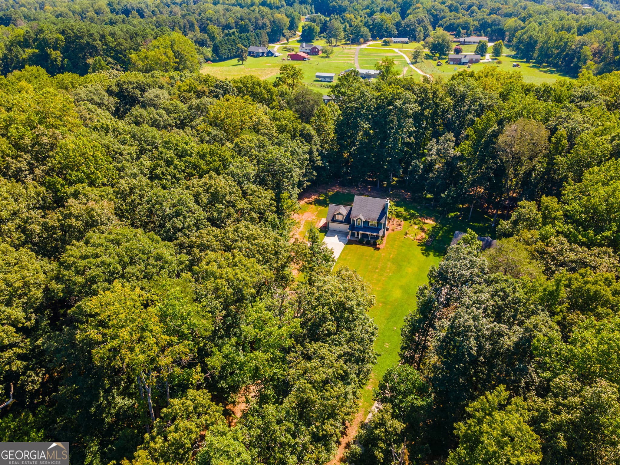 4 bedroom, 2.5 bathroom, 1,875 sq ft single family residence for sale at 8816 Shallow Creek Trail, Clermont, GA 30527 — photo 2