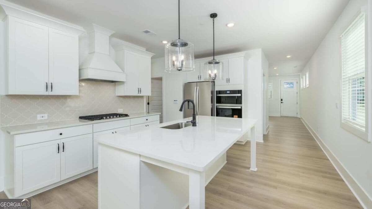 4 bedroom, 3 bathroom single family residence for sale at 1469 Longwing Lane, Marietta, GA 30066 — photo 6