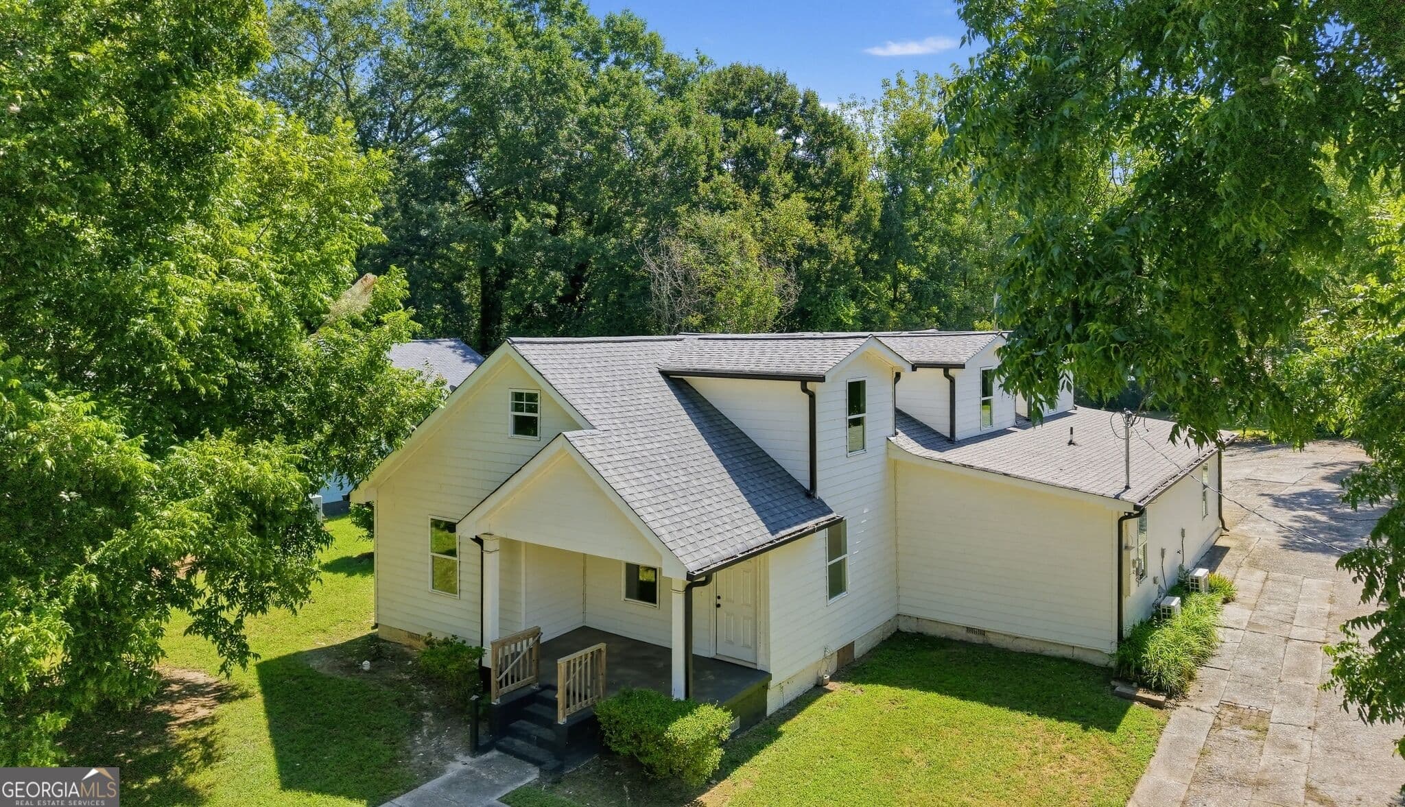 5 bedroom, 4 bathroom, 3,738 sq ft single family residence for sale at 134 E 5th Street, Monroe, GA 30655 — photo 3