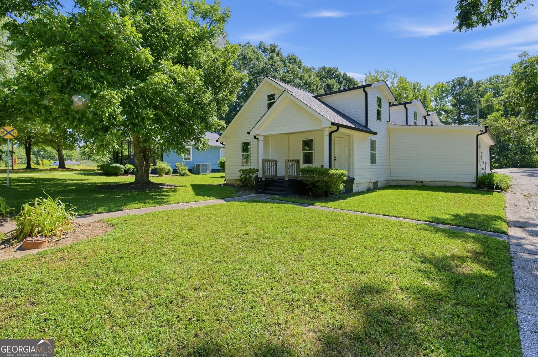 5 bedroom, 4 bathroom, 3,738 sq ft single family residence for sale at 134 E 5th Street, Monroe, GA 30655