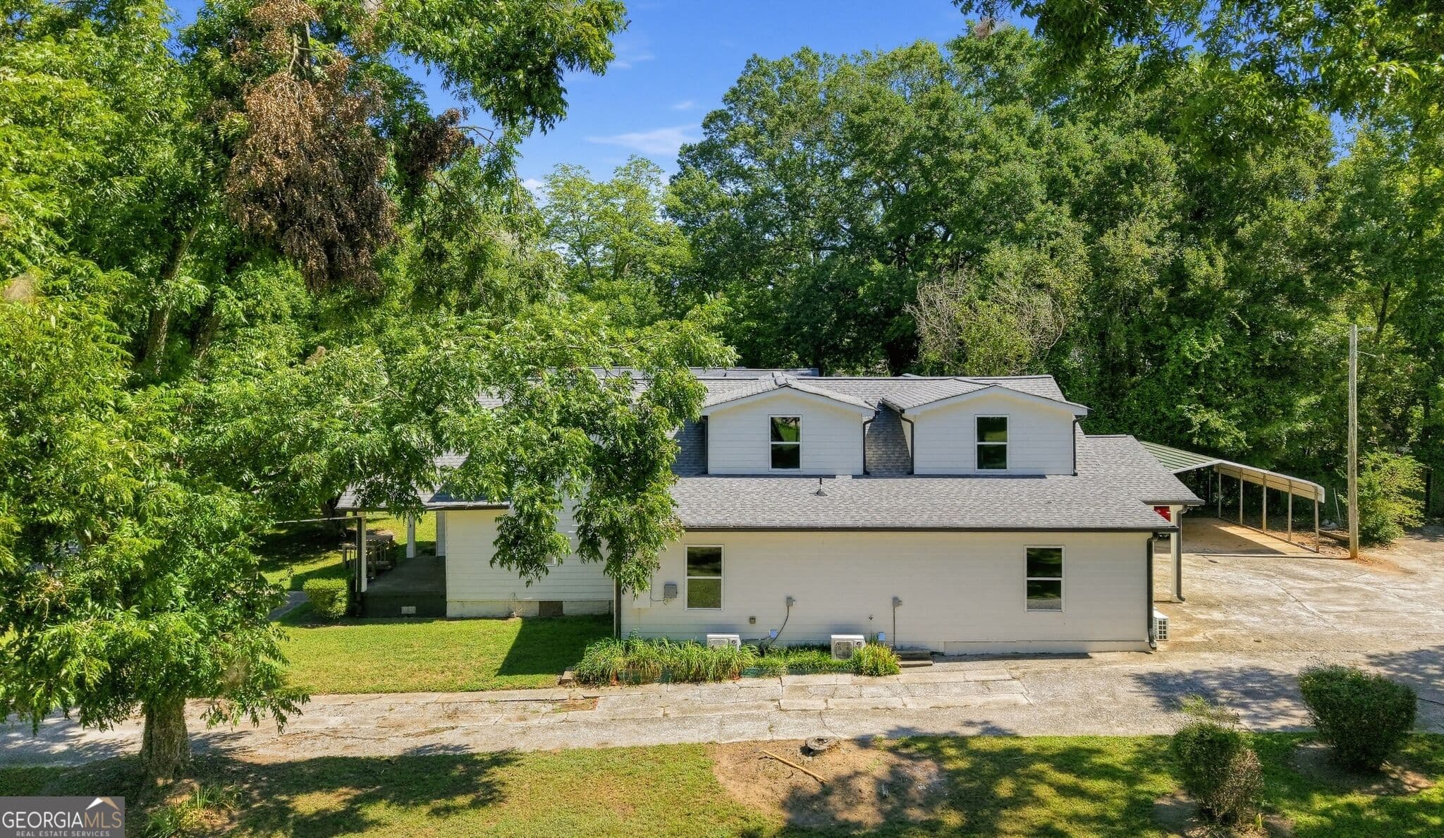 5 bedroom, 4 bathroom, 3,738 sq ft single family residence for sale at 134 E 5th Street, Monroe, GA 30655 — photo 5