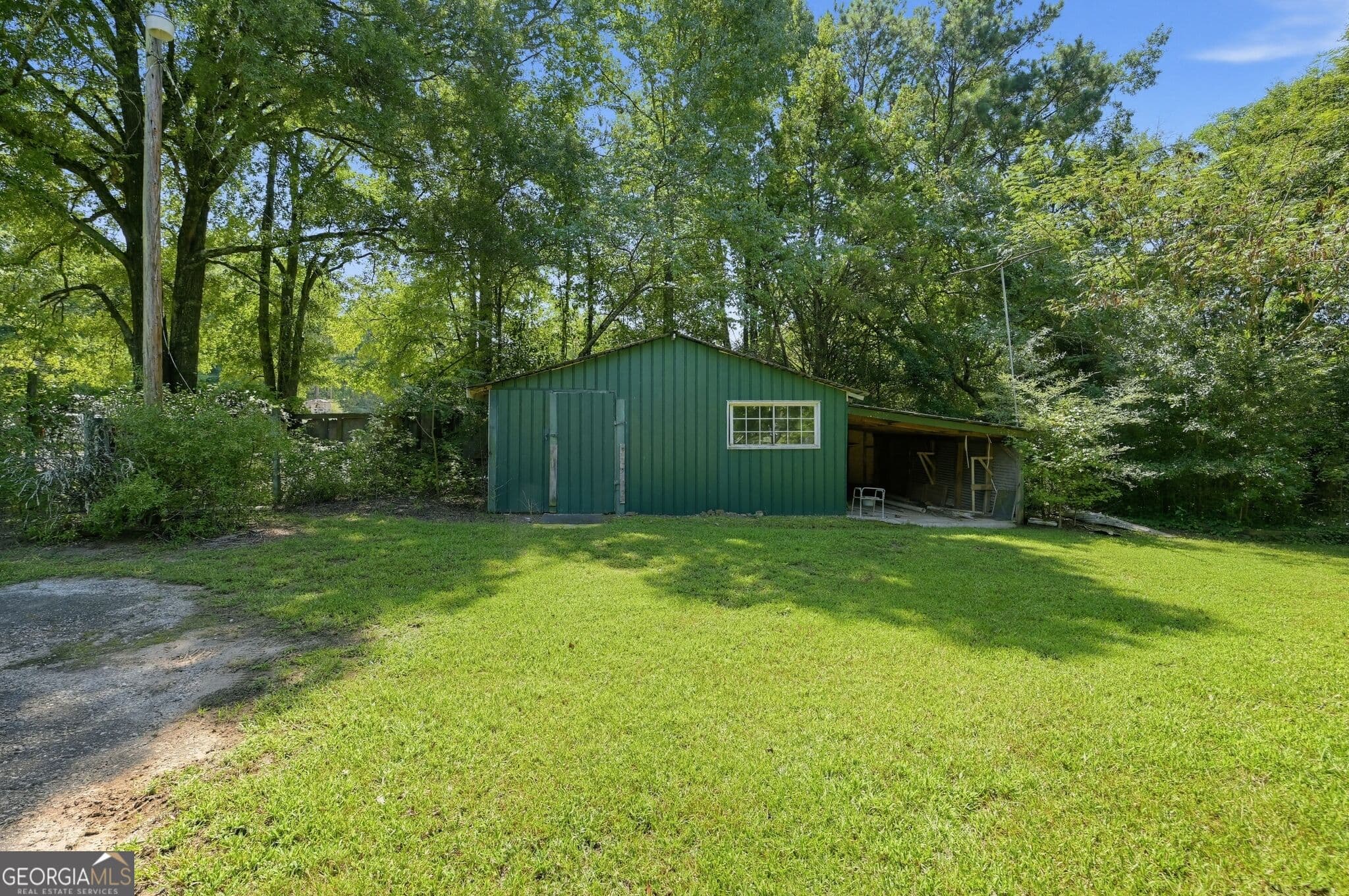 5 bedroom, 4 bathroom, 3,738 sq ft single family residence for sale at 134 E 5th Street, Monroe, GA 30655 — photo 10