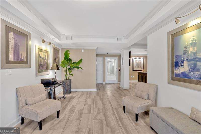 1 bedroom, 1 bathroom, 730 sq ft condominium for sale at 1075 Peachtree Walk A206, Atlanta, GA 30309 — photo 2