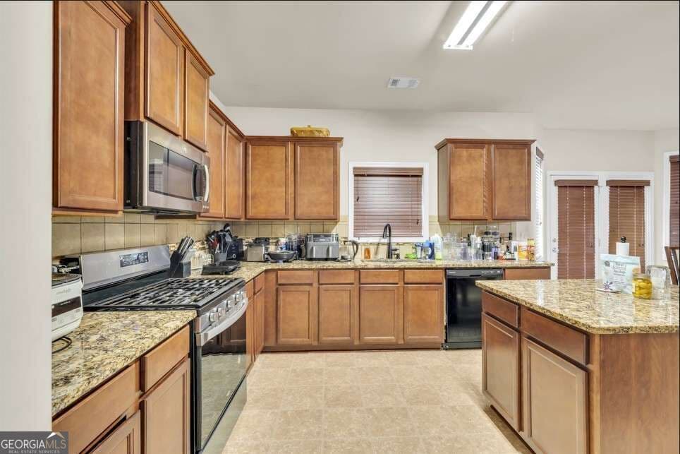 4 bedroom, 2.5 bathroom single family residence for sale at 7736 Old Thyme Road, Union City, GA 30291 — photo 2