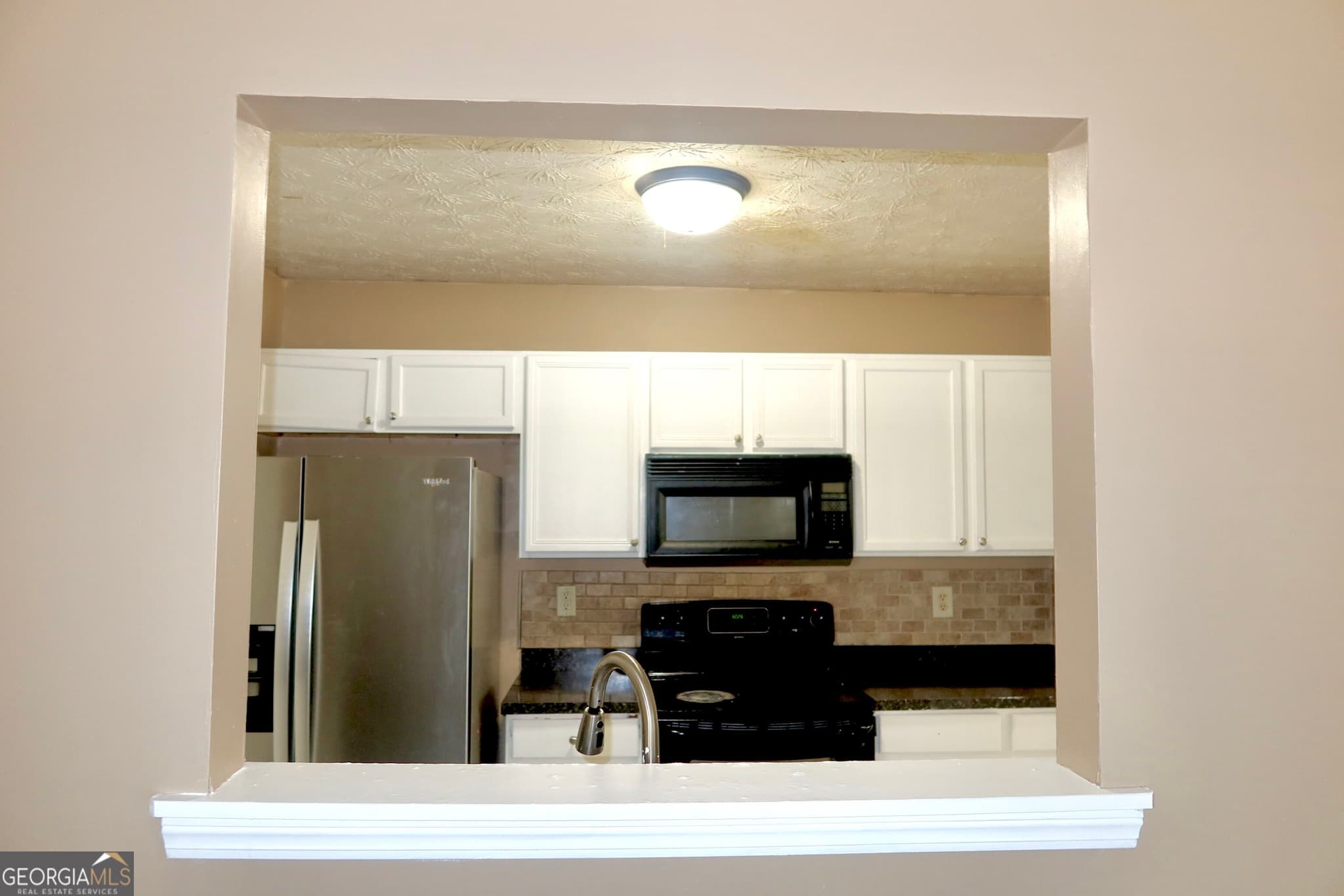 3 bedroom, 2 bathroom, 1,547 sq ft townhouse for sale at 6534 Wellington Chase Court, Lithonia, GA 30058 — photo 7
