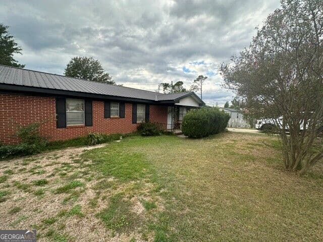 3 bedroom, 1.5 bathroom, 1,100 sq ft single family residence for sale at 419 Old Kibbee Road, Vidalia, GA 30474 — photo 2