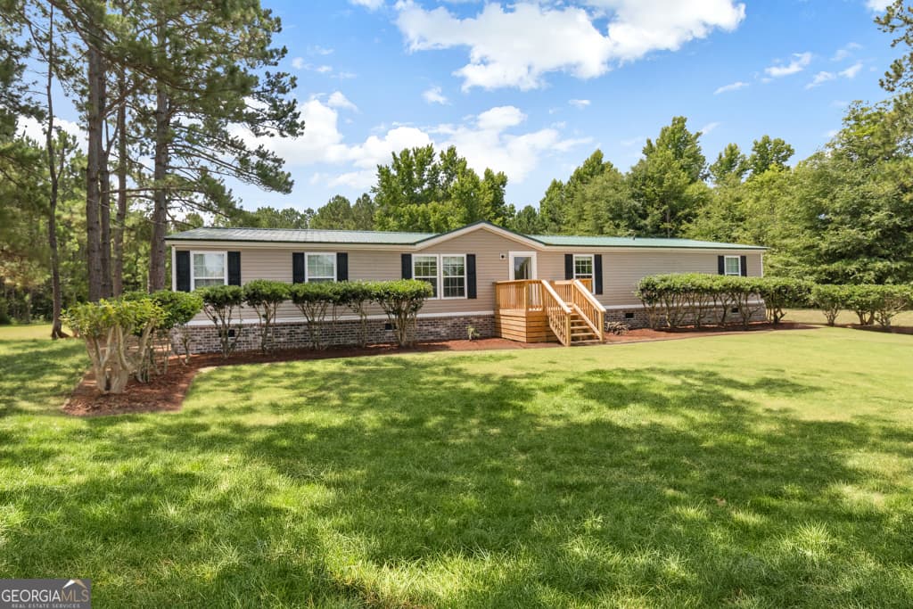 4 bedroom, 2 bathroom, 2,052 sq ft mobile home sold at 1310 Lee Road, Pembroke, GA 31321