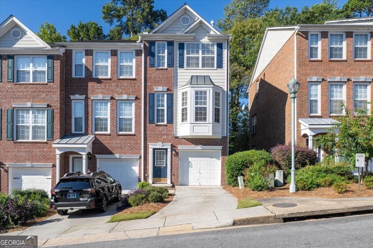 2 bedroom, 2.5 bathroom, 1,650 sq ft single family residence for sale at 3164 Mill Springs Circle, Buford, GA 30519 — photo 2